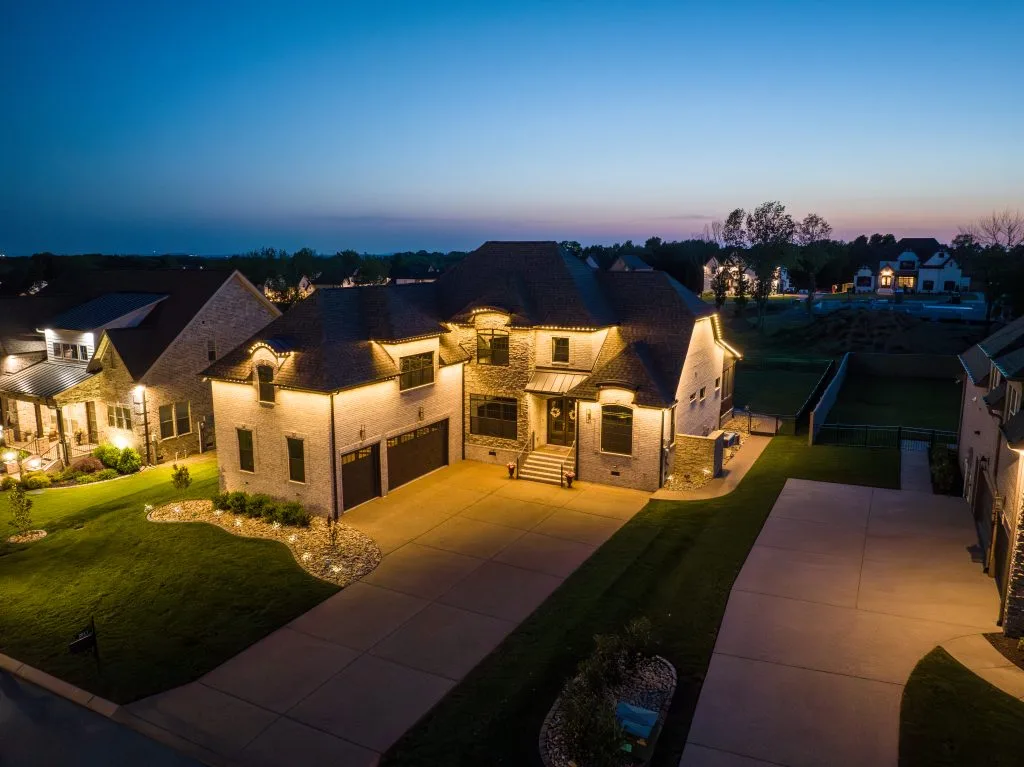 Knoxville TN home illuminated at twilight in a serene neighborhood setting