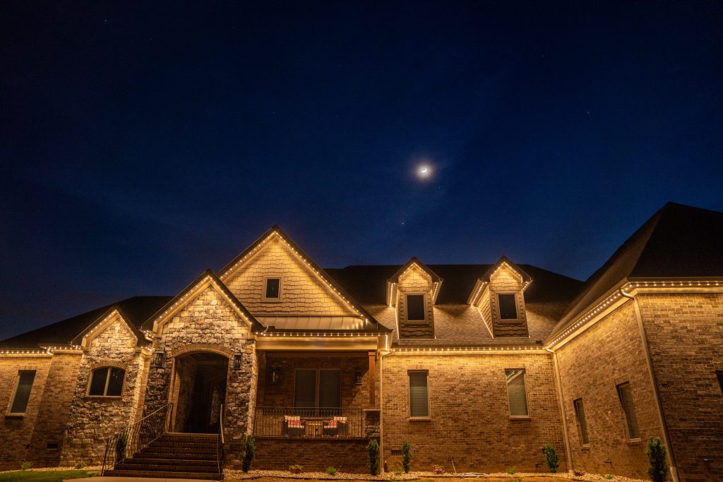 Evening Facade With Discreet soffit under eave lighting